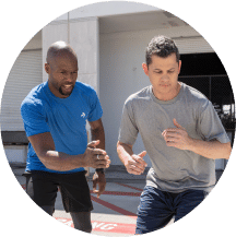personal trainer coaching a client outdoors located on the ace fitness personal trainer certification webpage